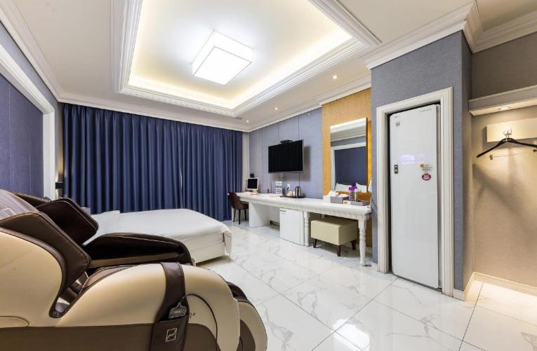 TV a/nebo společenská místnost v ubytování Hello Hotel