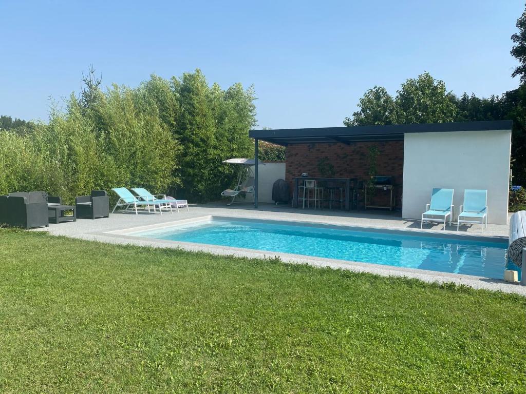 Bazén v ubytování Maison avec piscine, Ker Animheart nebo v jeho okolí