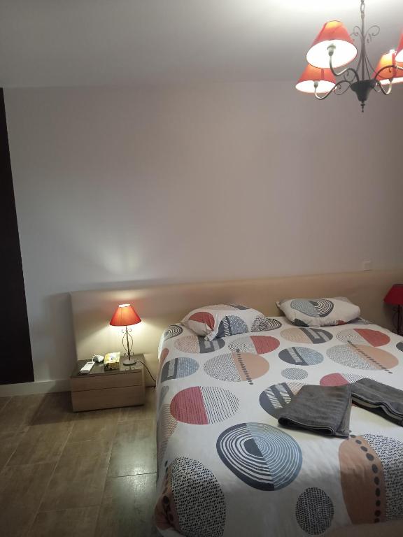 Postel nebo postele na pokoji v ubytování Maison avec piscine, Ker Animheart