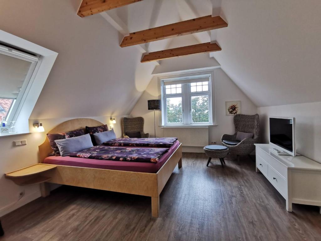 Postel nebo postele na pokoji v ubytování Villa Deichvoigt