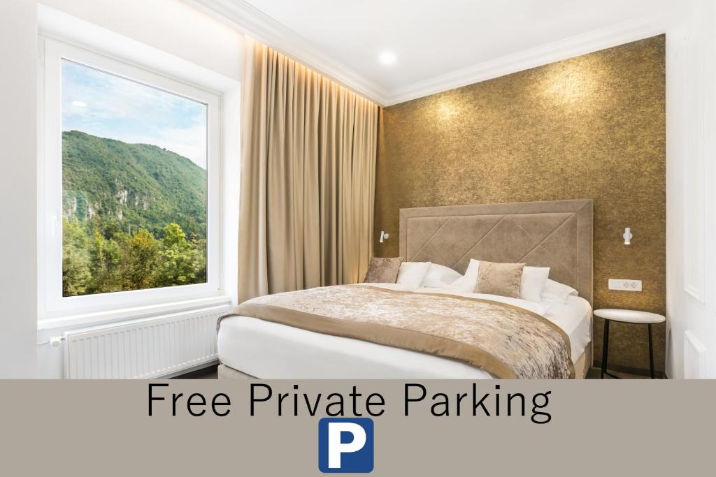 Postel nebo postele na pokoji v ubytování Garni Hotel Cirman