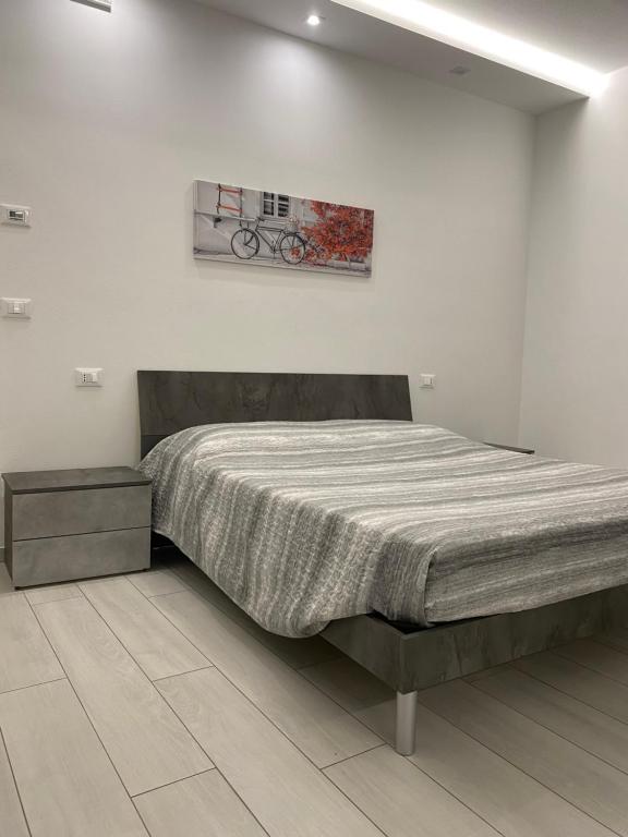 Postel nebo postele na pokoji v ubytování RoomsCarli