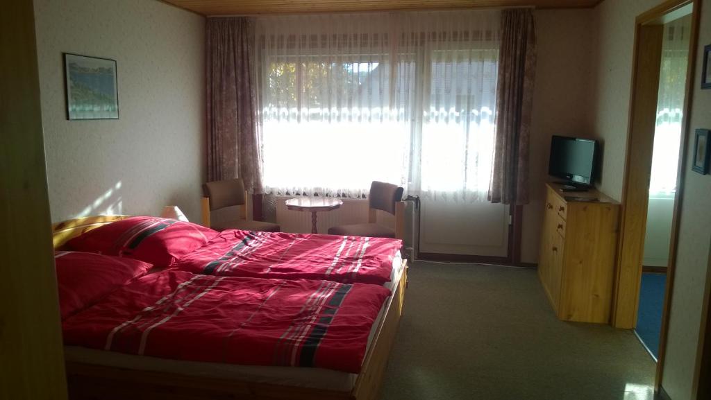 Postel nebo postele na pokoji v ubytování Wiedaer Hütte