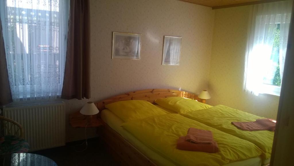 Postel nebo postele na pokoji v ubytování Wiedaer Hütte