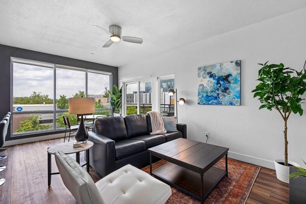a living room with a couch and a table at Gorgeous Central City 2BD 2BA in Salt Lake City