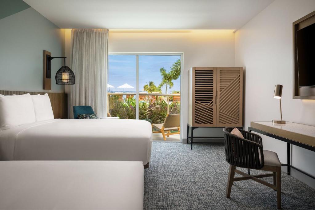Voodi või voodid majutusasutuse Courtyard by Marriott Curacao toas