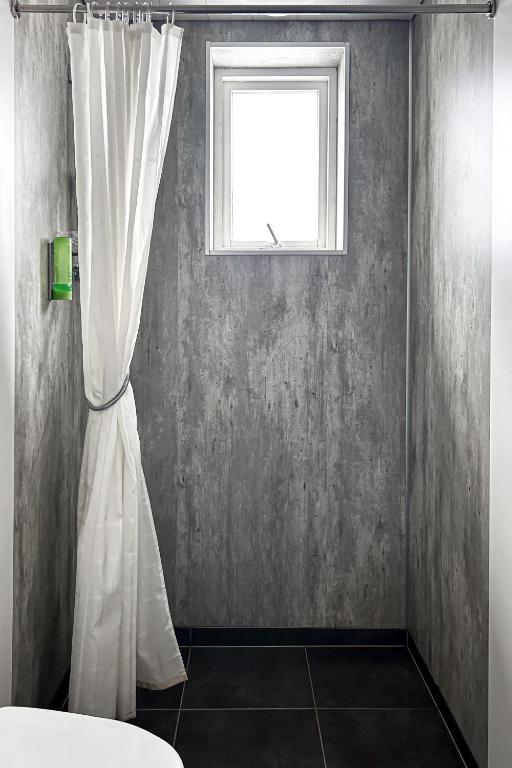 Postel nebo postele na pokoji v ubytování Hotel Jökull