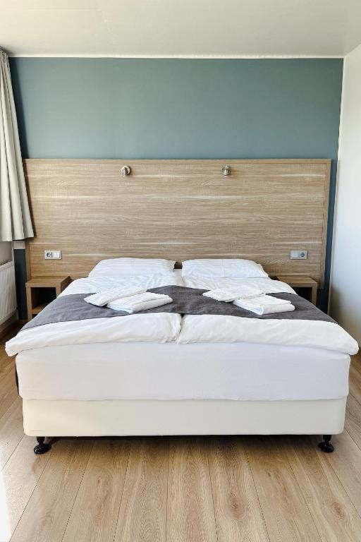 Postel nebo postele na pokoji v ubytování Hotel Jökull