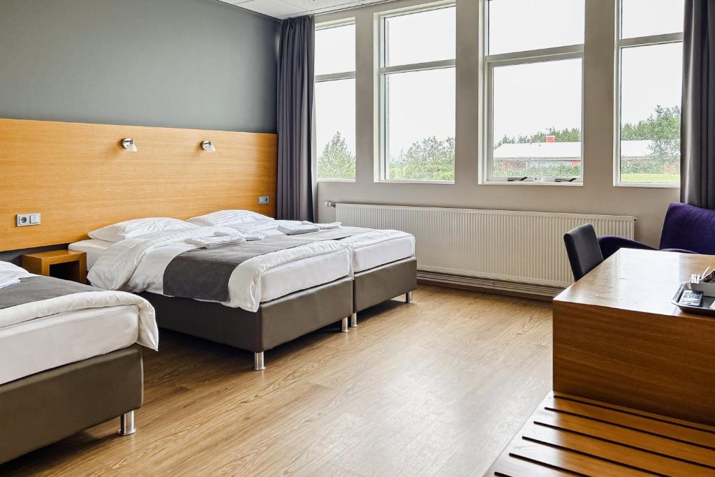 Postel nebo postele na pokoji v ubytování Hotel Jökull