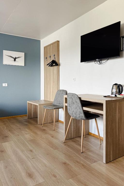 TV a/nebo společenská místnost v ubytování Hotel Jökull