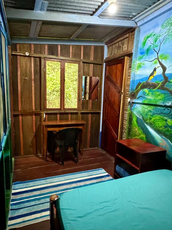 Postel nebo postele na pokoji v ubytování Hidden Jungle Beach House