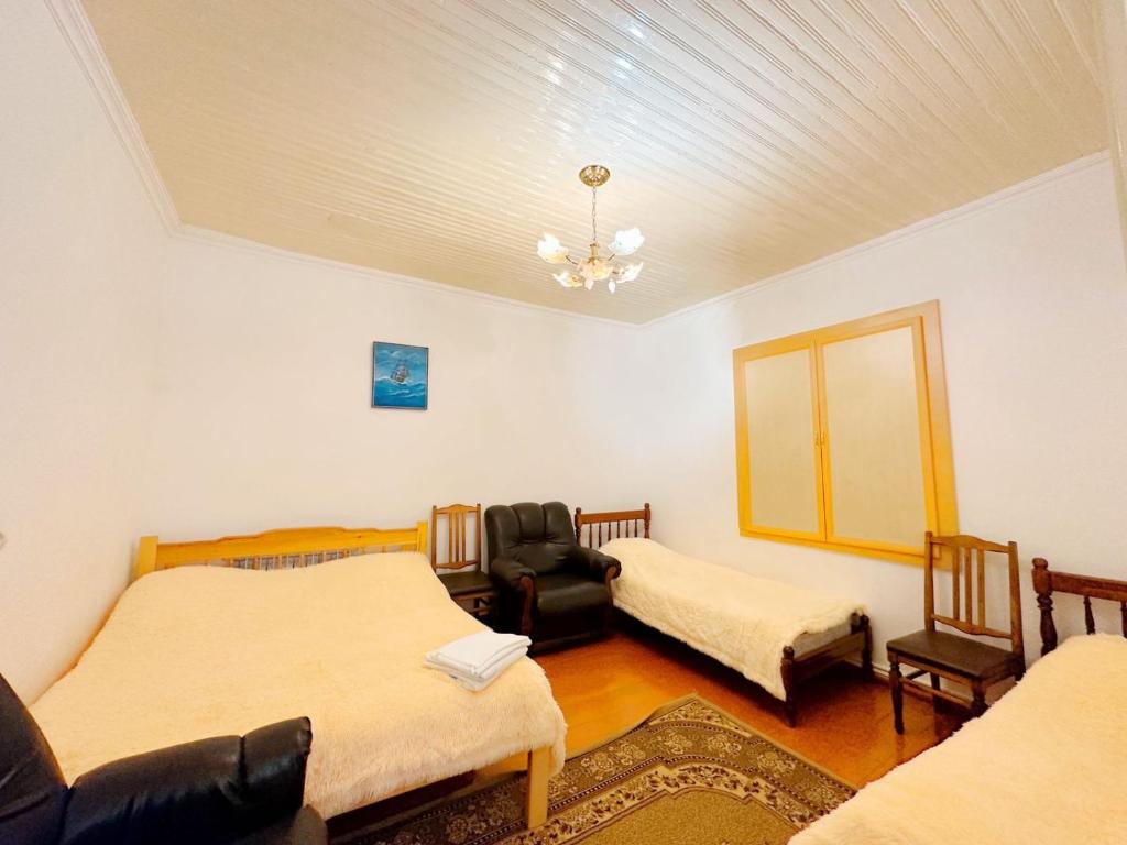 Postel nebo postele na pokoji v ubytování Green Garden B&B