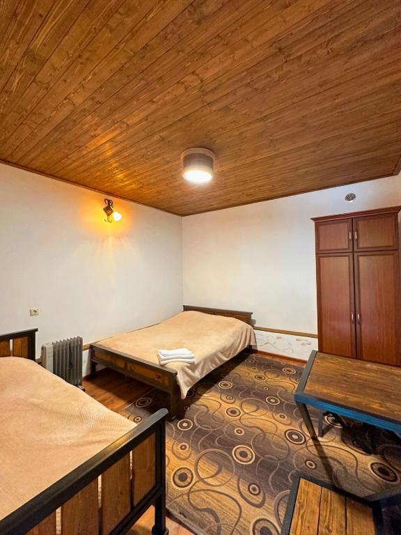 Postel nebo postele na pokoji v ubytování Green Garden B&B
