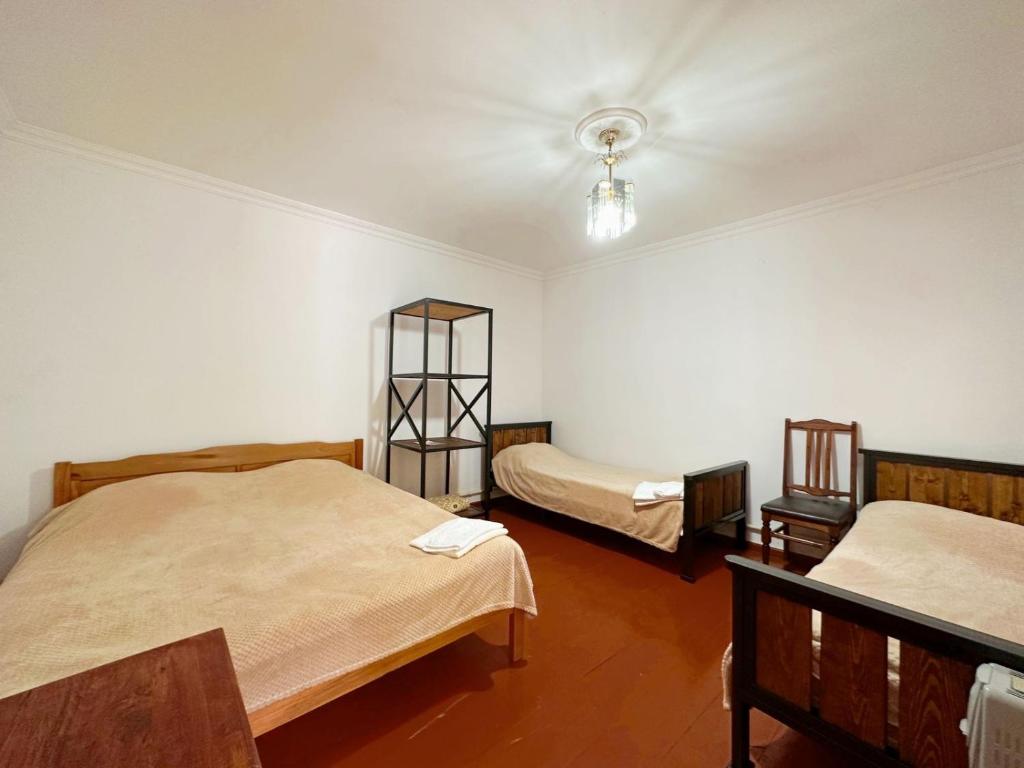 Postel nebo postele na pokoji v ubytování Green Garden B&B