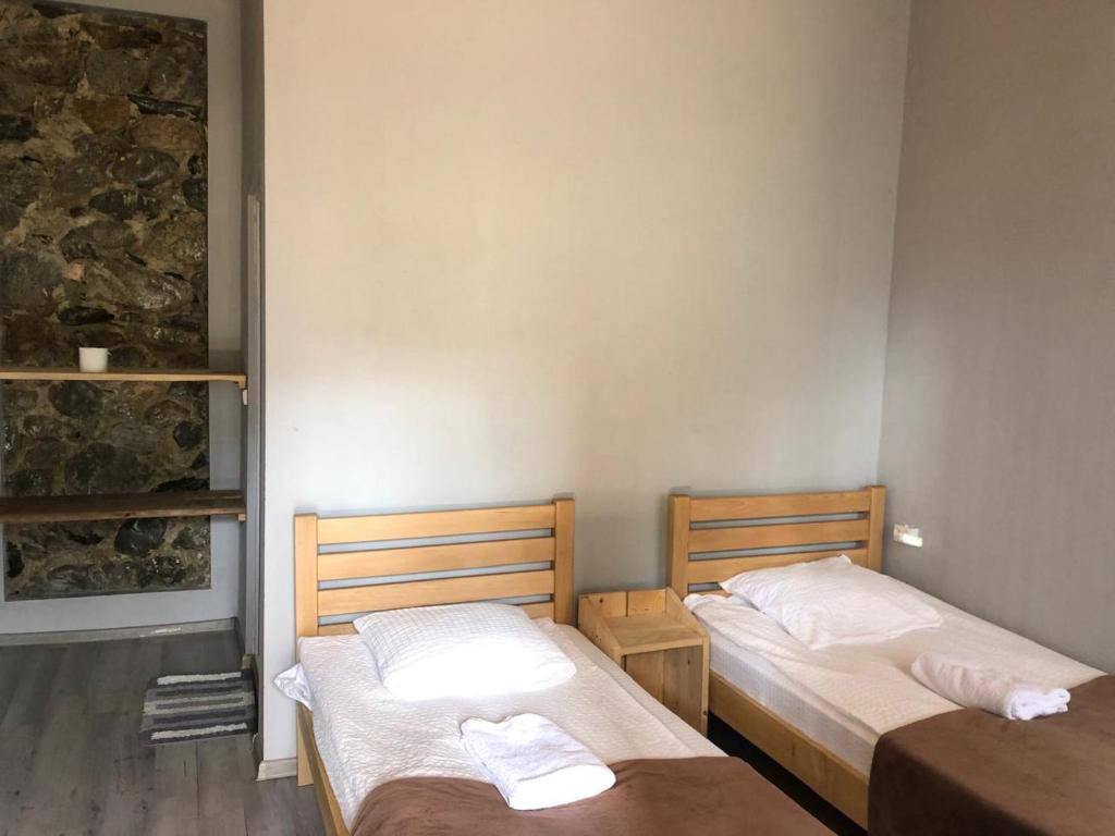 Postel nebo postele na pokoji v ubytování Guest House Nike