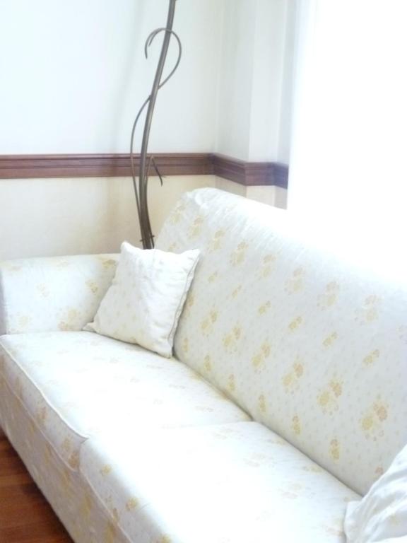 Postel nebo postele na pokoji v ubytování Hotel Minerva