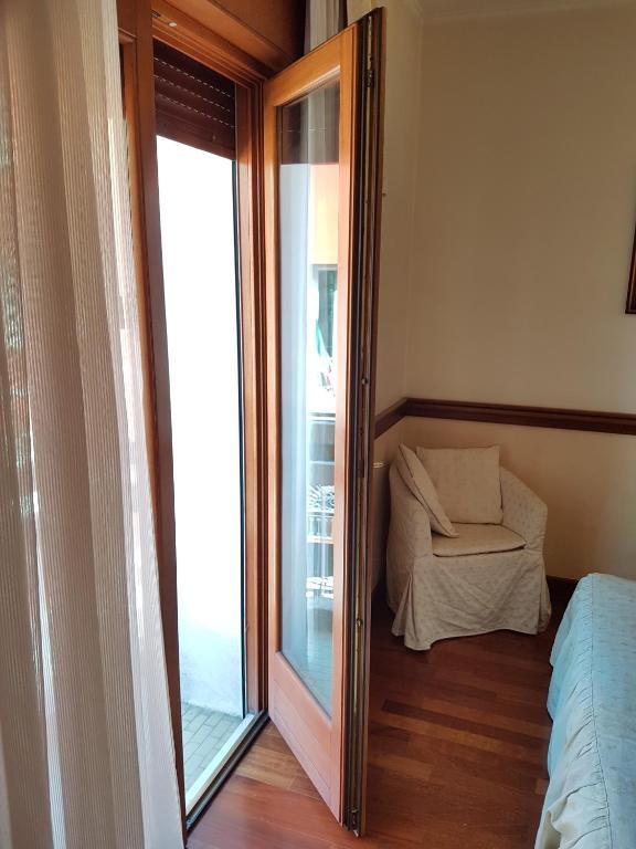 Postel nebo postele na pokoji v ubytování Hotel Minerva