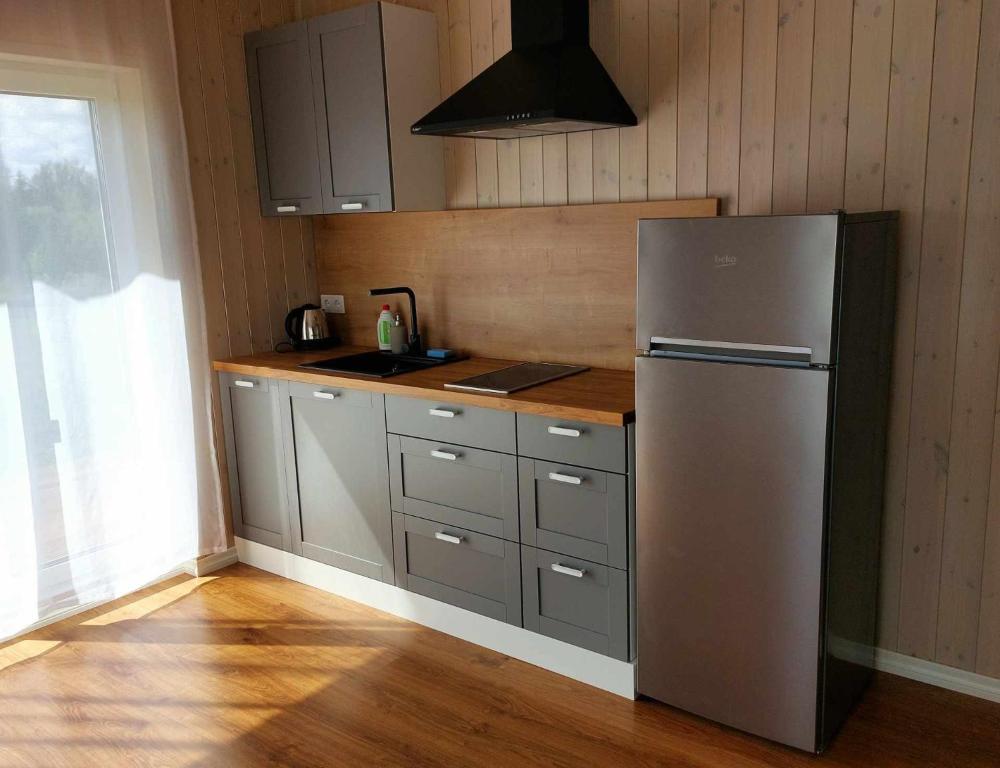 Kuchyň nebo kuchyňský kout v ubytování Oruheina Bungalow