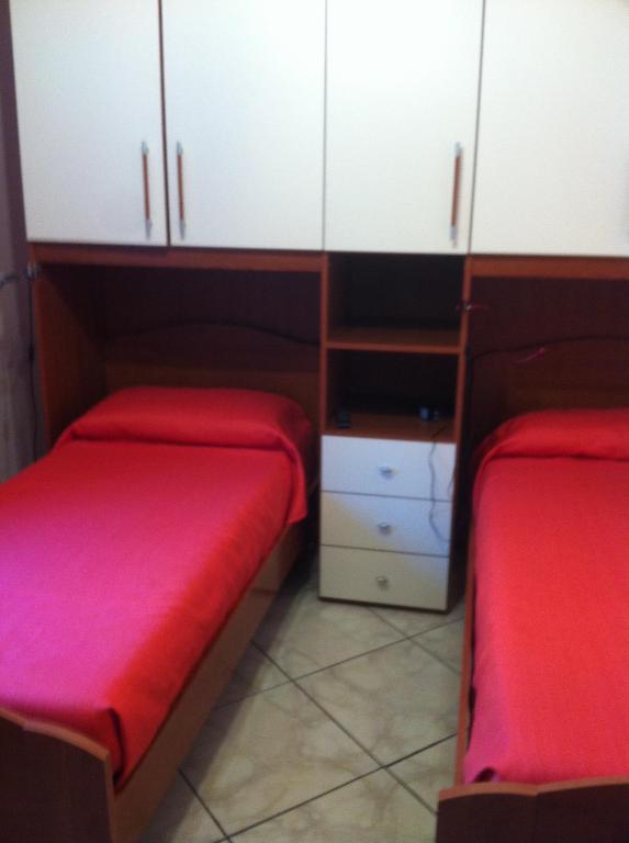 A bed or beds in a room at Annie's Home