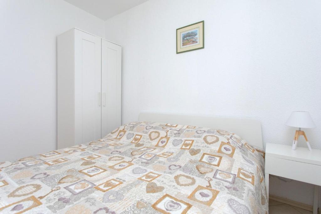 Posteľ alebo postele v izbe v ubytovaní Holiday house Nena with pool