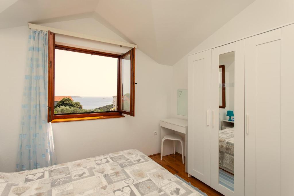 Posteľ alebo postele v izbe v ubytovaní Holiday house Nena with pool