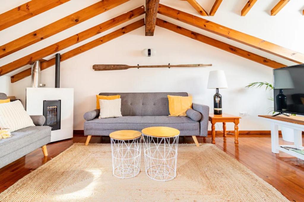 Televízia a/alebo spoločenská miestnosť v ubytovaní Casa marinera céntrica en Comillas