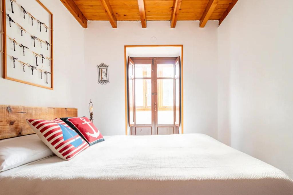 Posteľ alebo postele v izbe v ubytovaní Casa marinera céntrica en Comillas