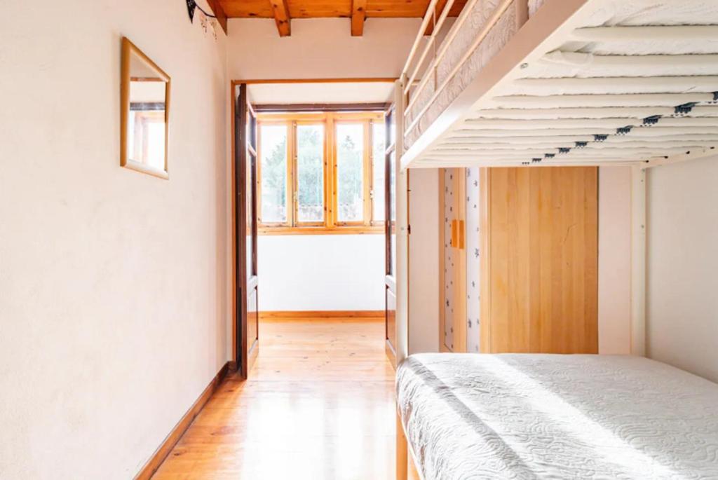 Posteľ alebo postele v izbe v ubytovaní Casa marinera céntrica en Comillas