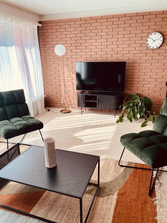TV a/nebo společenská místnost v ubytování NH 1 Interlaken-Luzern Lake I Mountain I unique I connect