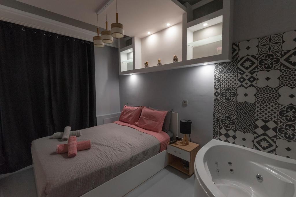 Postel nebo postele na pokoji v ubytování VIP Apt. Pezodromos Kalamarias