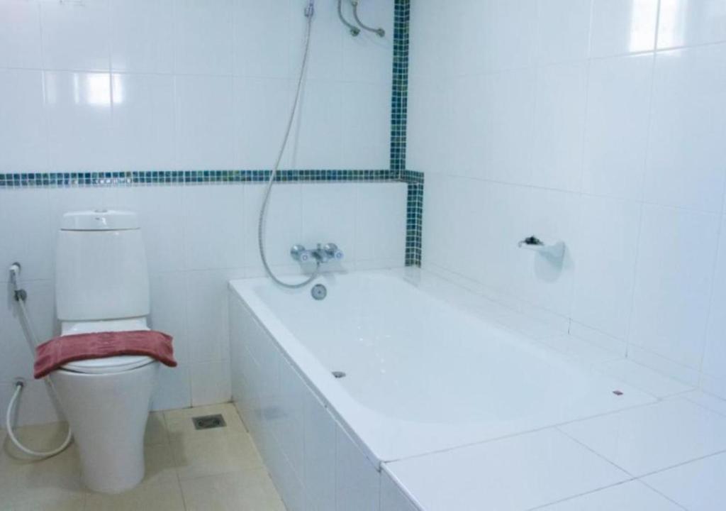 Koupelna v ubytování Convenient Grand Plus Hotel Suvarnabhumi
