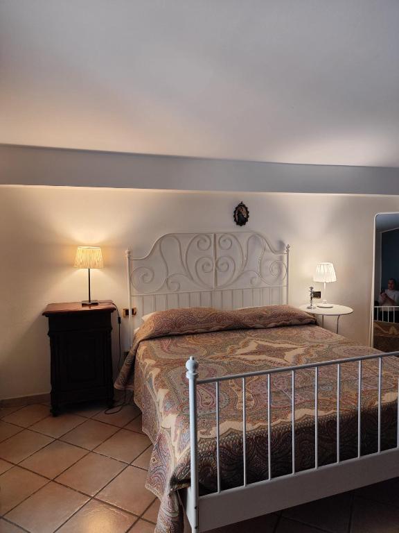 A bed or beds in a room at Vacanze al Mare Patrizia's Sweet Home