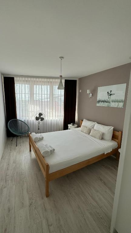 Postel nebo postele na pokoji v ubytování Queen Bed- Rooms GEA