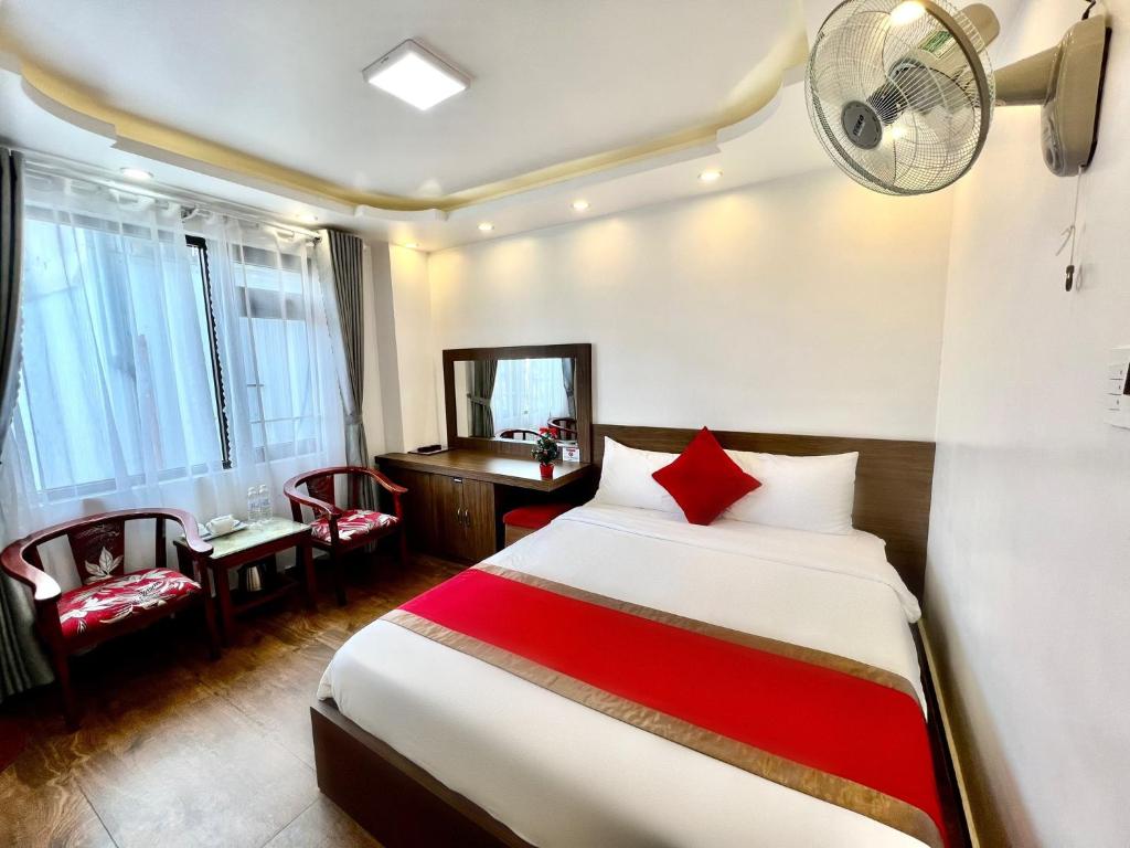 Giường trong phòng chung tại Le Tuan Minh Hotel