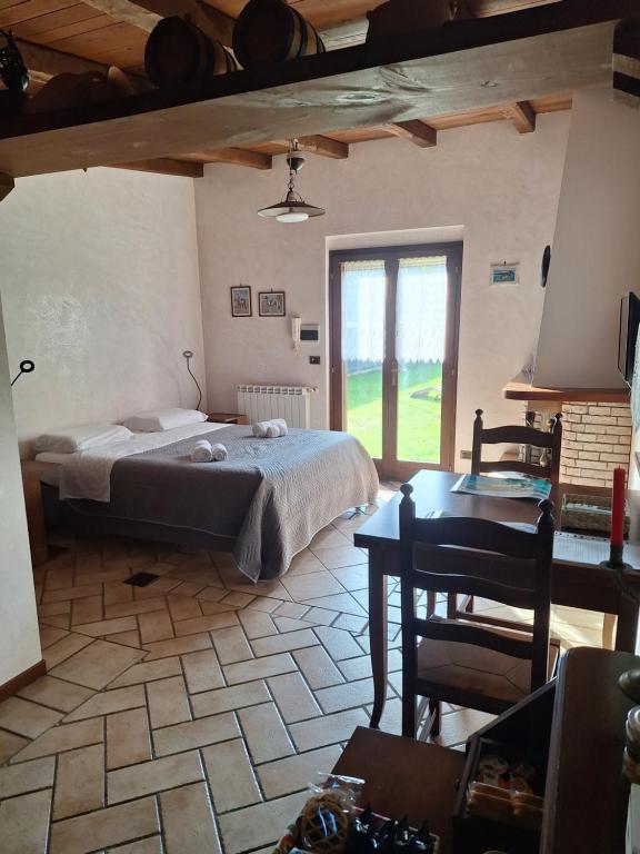 Postel nebo postele na pokoji v ubytování B&B Monte Tavolino