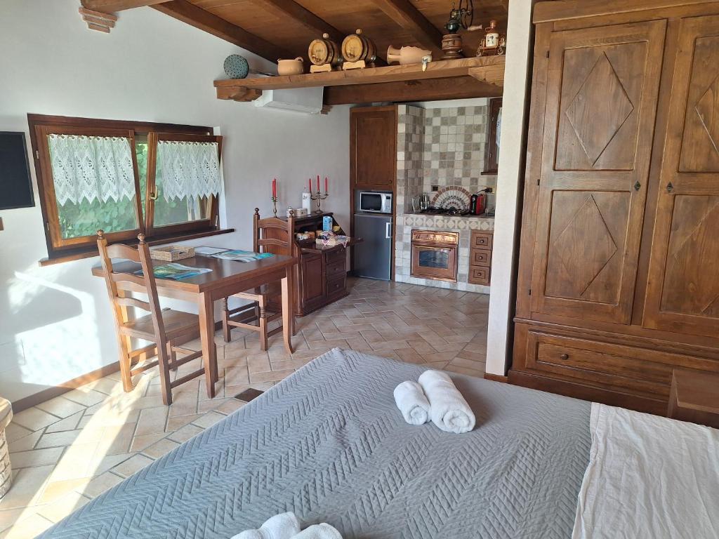 Postel nebo postele na pokoji v ubytování B&B Monte Tavolino