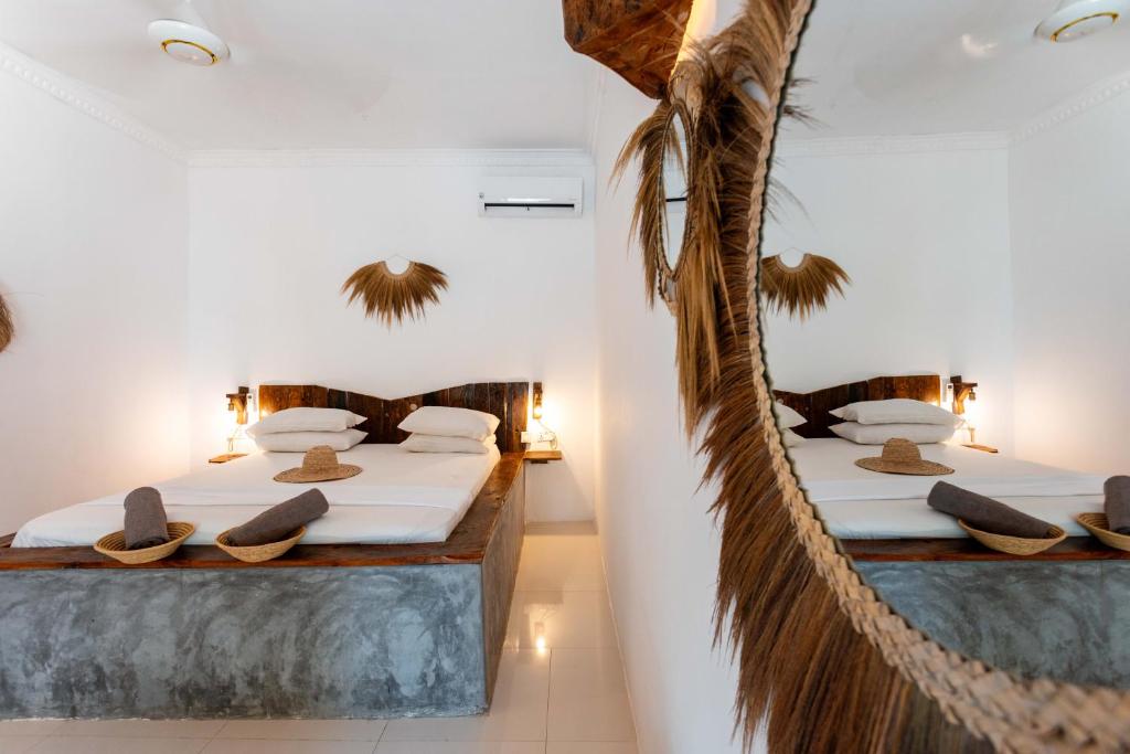 Postel nebo postele na pokoji v ubytování Maisha Matamu Beach Hotel Paje