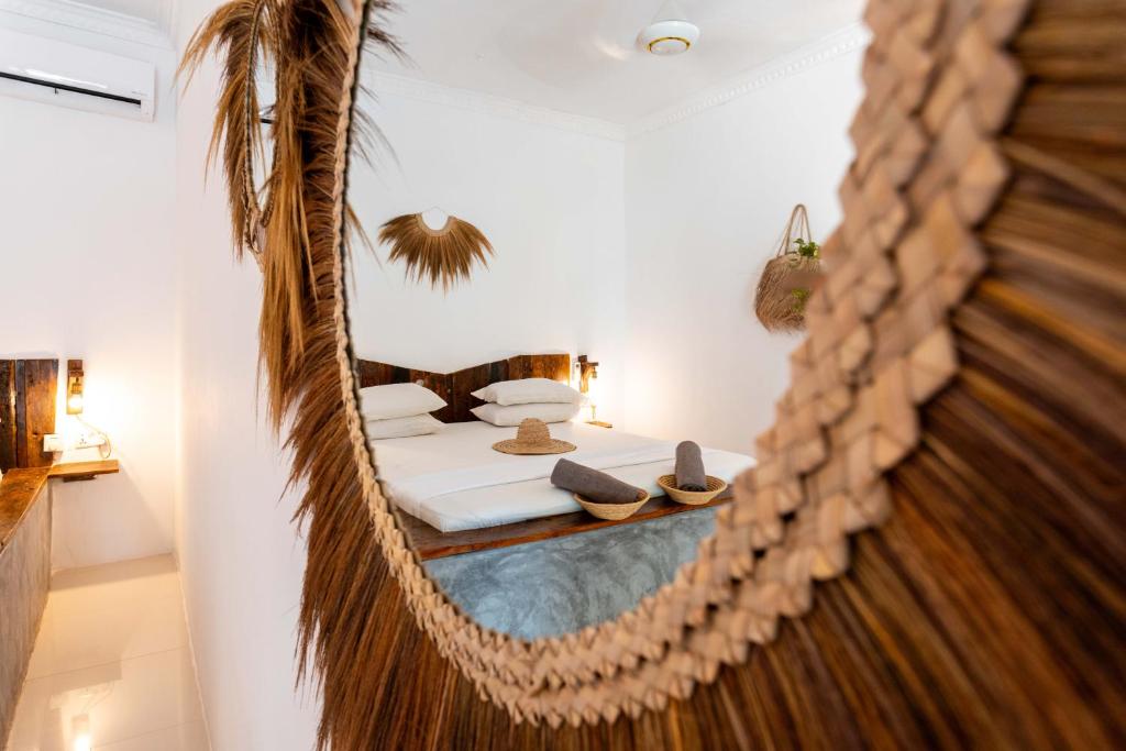 Postel nebo postele na pokoji v ubytování Maisha Matamu Beach Hotel Paje