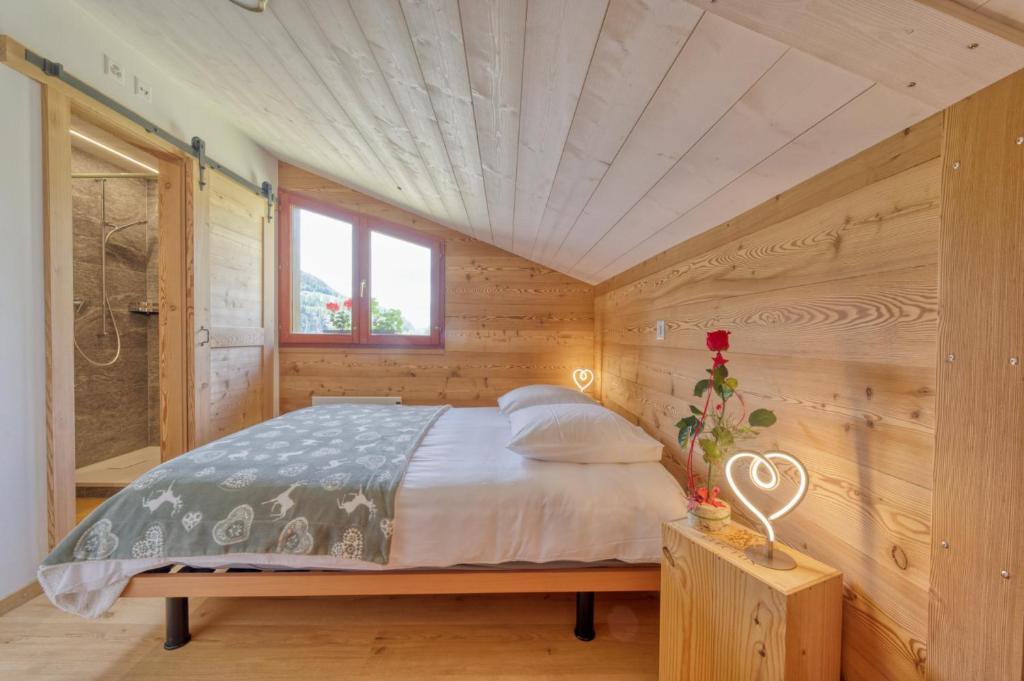 Postel nebo postele na pokoji v ubytování Au Bivouac de Napoléon et Spa