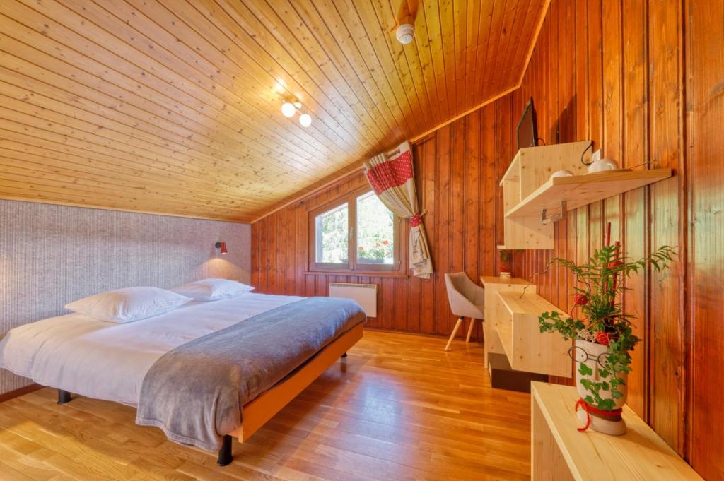 Postel nebo postele na pokoji v ubytování Au Bivouac de Napoléon et Spa