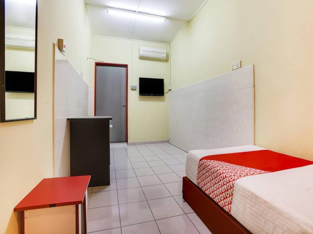 Postel nebo postele na pokoji v ubytování Hotel Rim Global, Klang