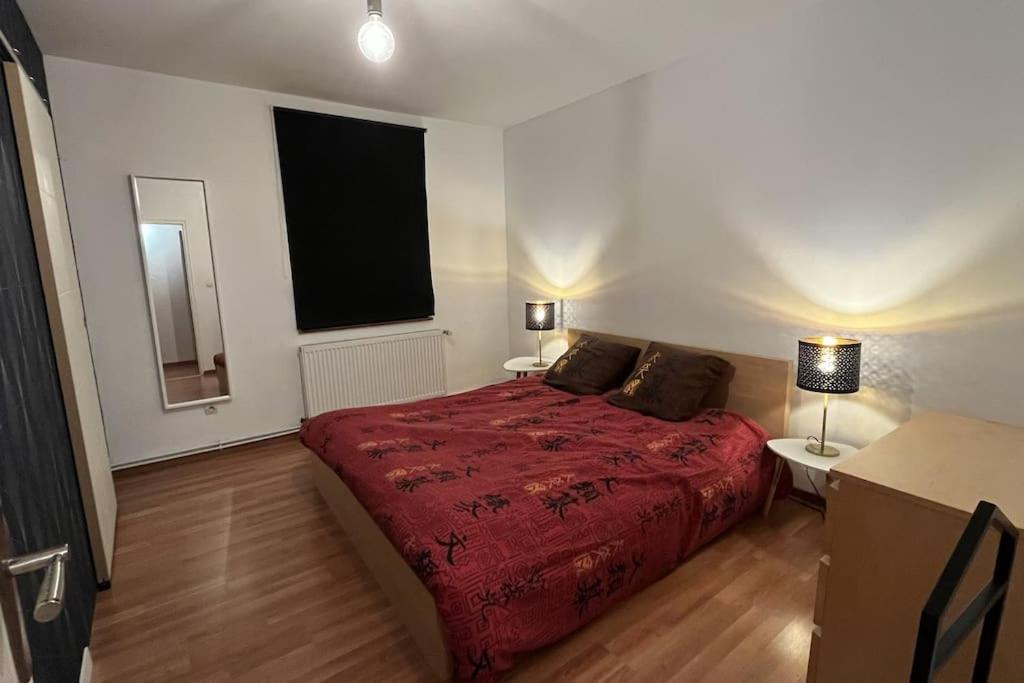 Postel nebo postele na pokoji v ubytování Grand appartement à Barr