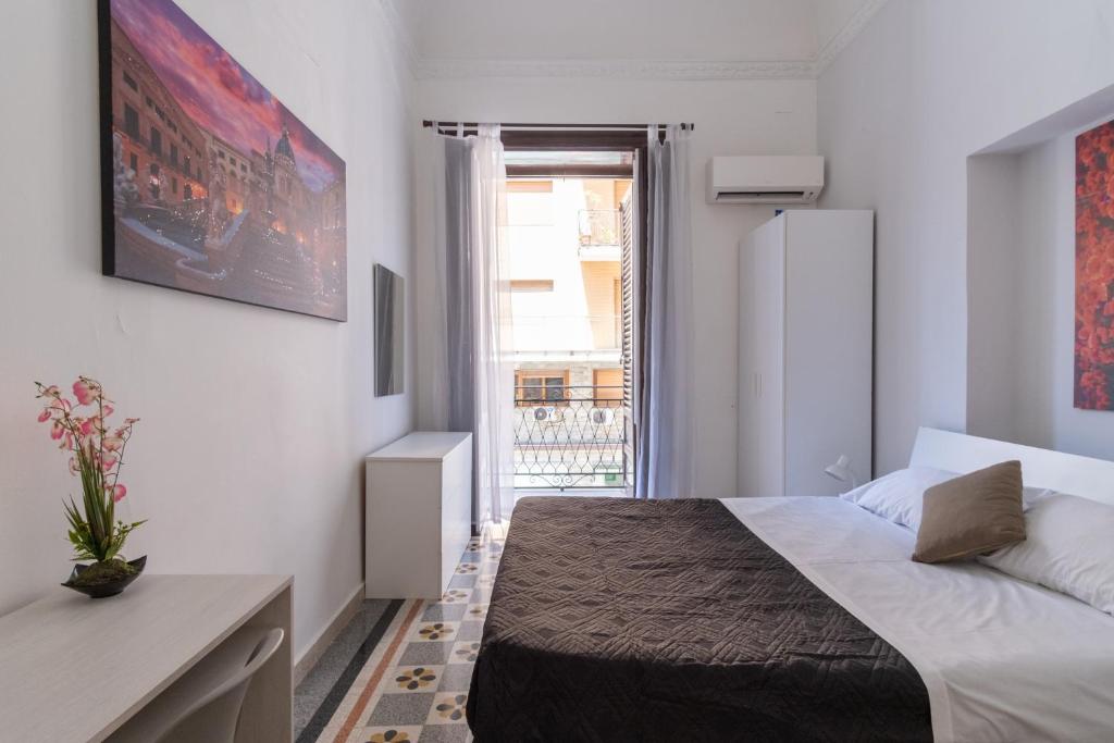 Posteľ alebo postele v izbe v ubytovaní Corner Rome 433