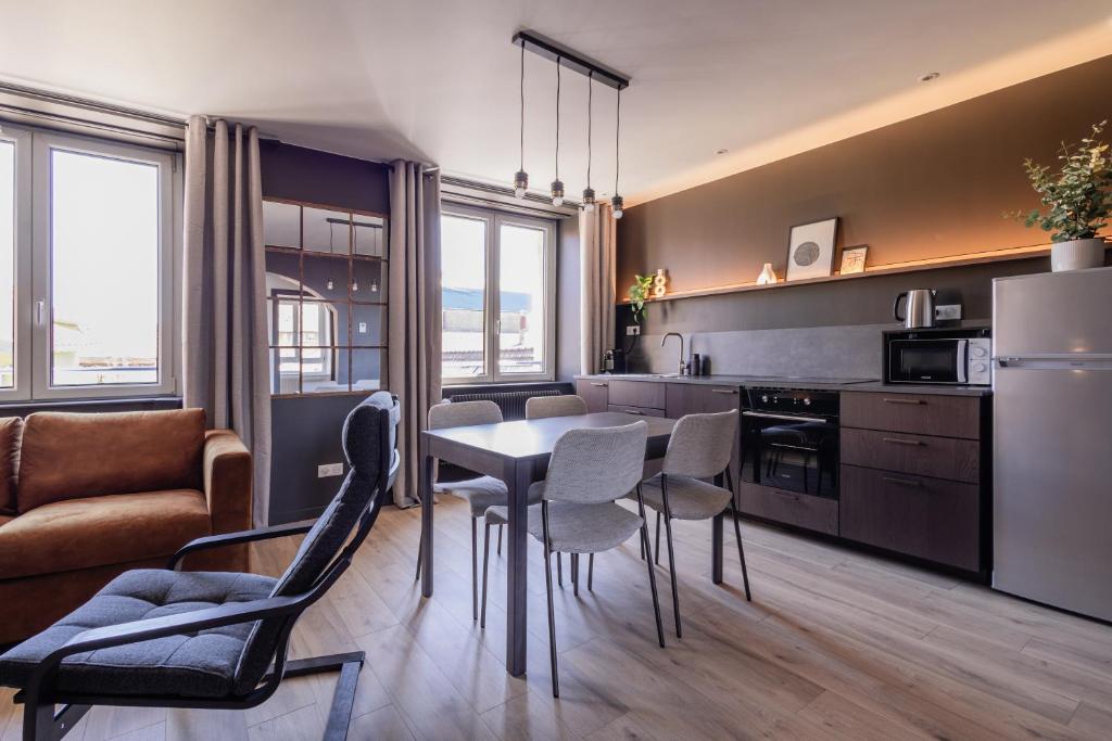 Kuchyň nebo kuchyňský kout v ubytování Votre expérience cinéma - Parenthèse nocturne