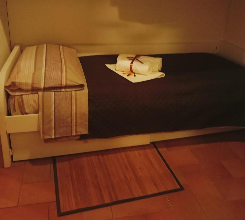 Postel nebo postele na pokoji v ubytování La soffitta di Megan