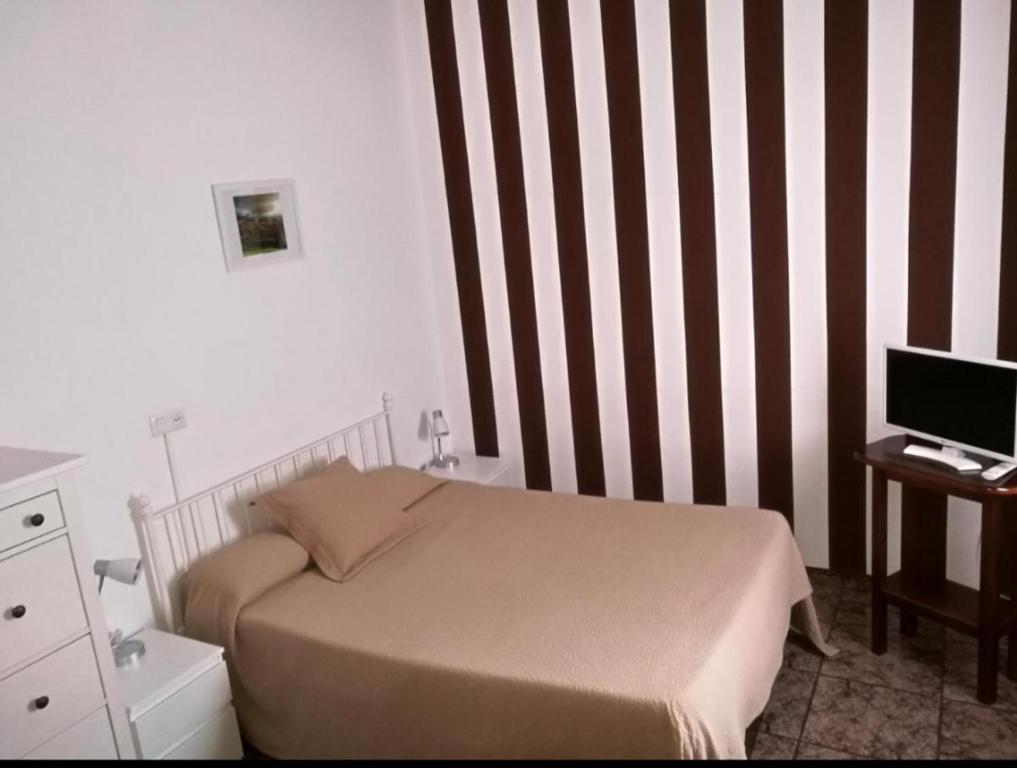 Cama o camas de una habitación en Hotel Solatorre