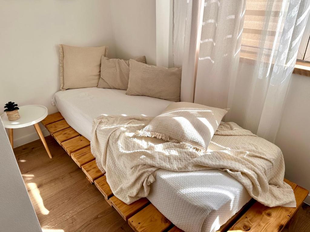 Postel nebo postele na pokoji v ubytování Apartmány Zahražany