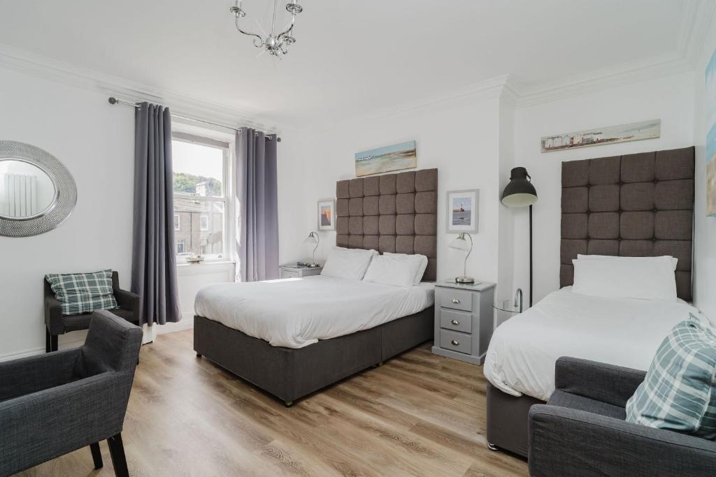 Кровать или кровати в номере The Roxburgh Guest Accommodation