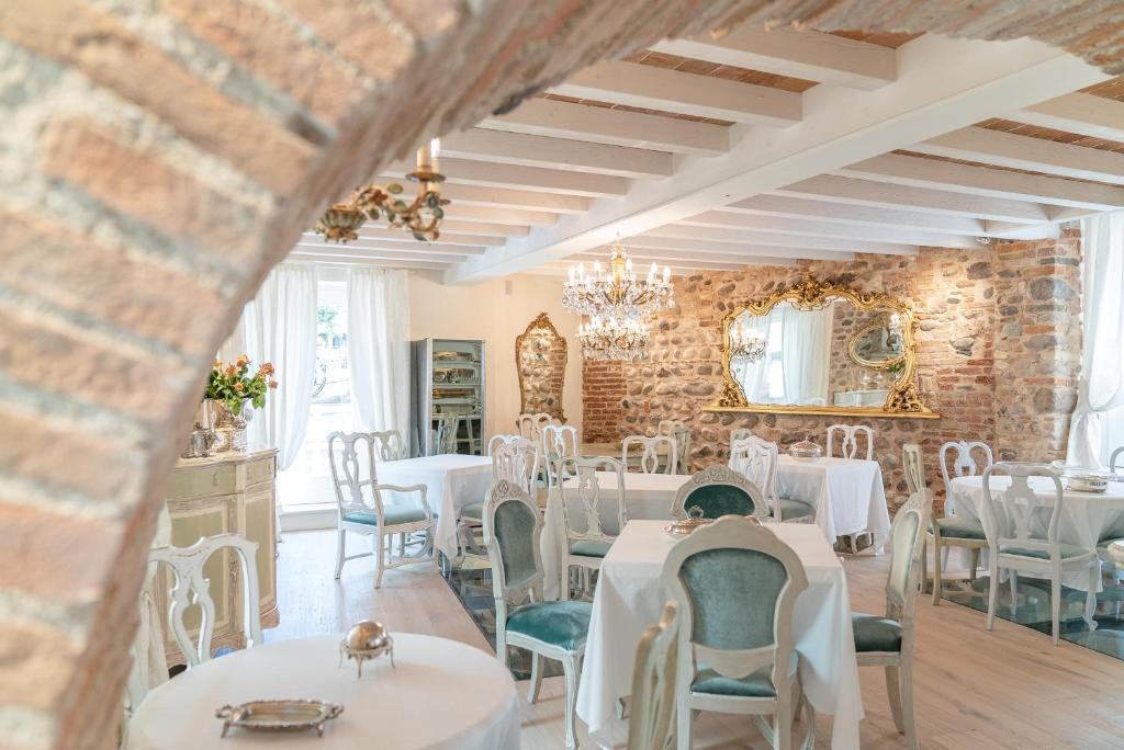Posezení v ubytování Regia Rosetta - Royal Rooms Borghetto