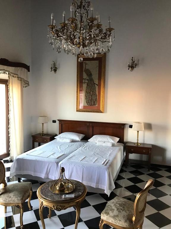 Postel nebo postele na pokoji v ubytování Casa Rosa